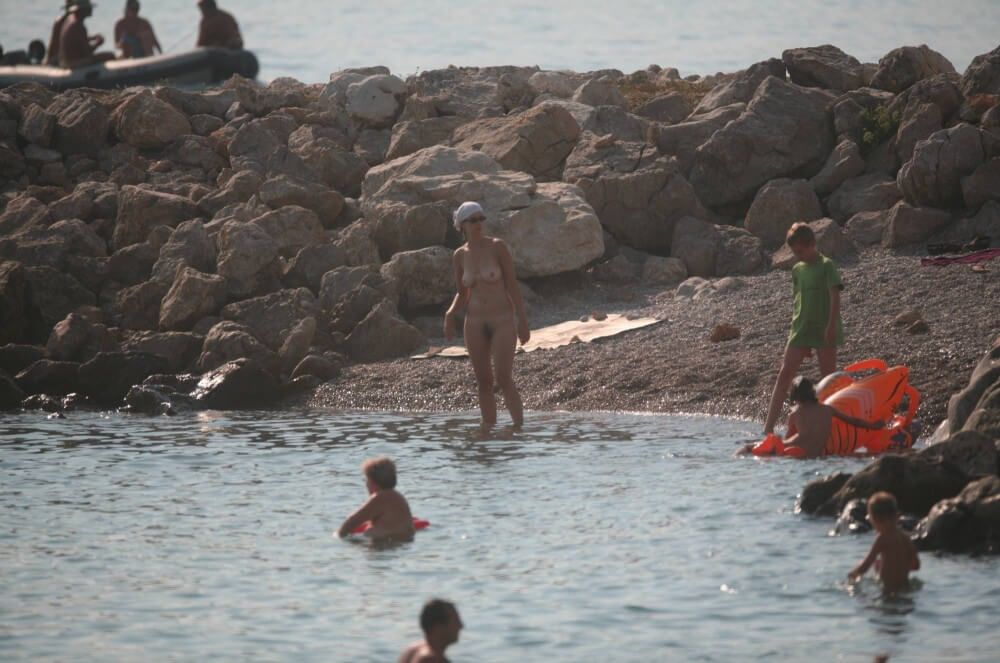 FKK cove pyramid in waters - nudism and naturism