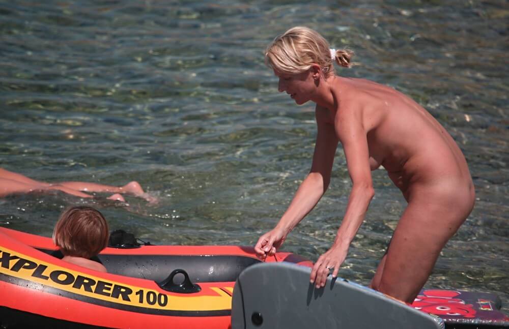 Red Boating for Two Nudists pics - nudism and naturism