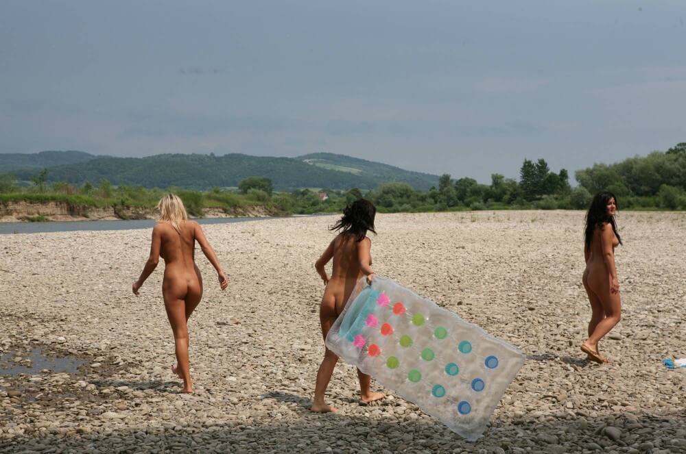 Naturist Park Floating On River photos - nudism and naturism