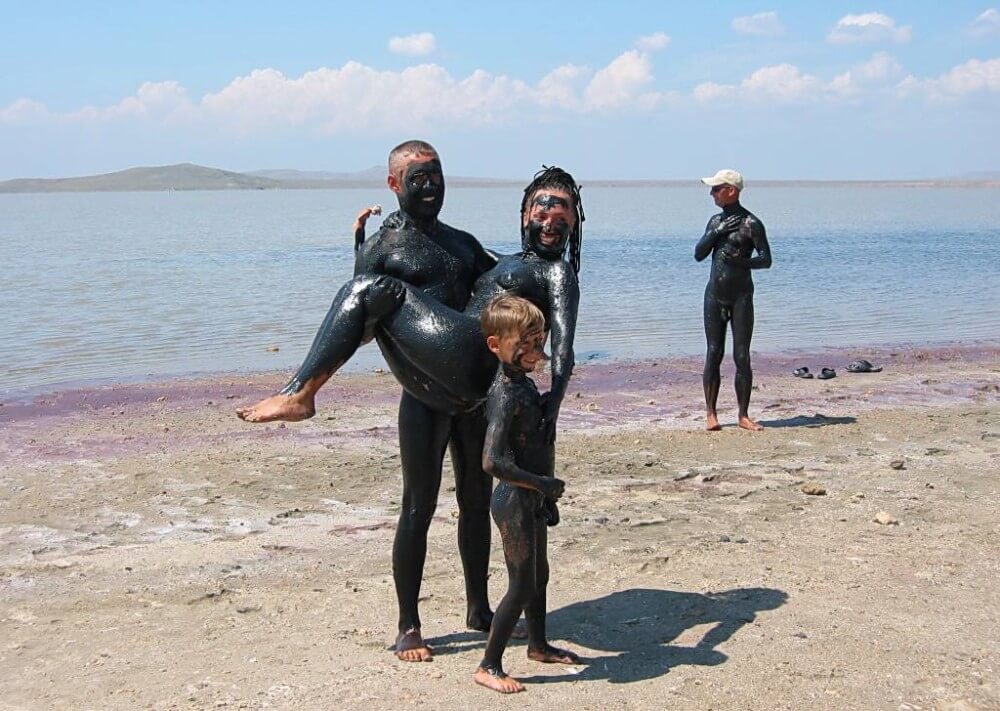 Dark Mud And Clear Water pics - nudism and naturism