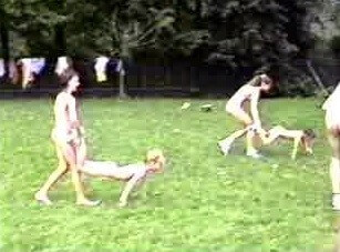 A nudist gathering at the stadium and sports - nudism and naturism