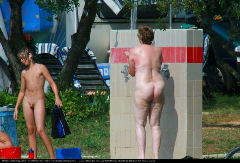 Covered in Towel Nudists-Boardwalk Biking - nudism and naturism