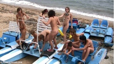 A group of naturists at sea - nudism and naturism