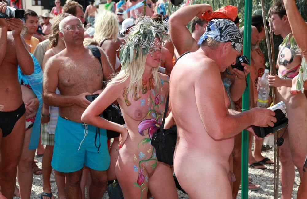 Neptune Painting Couple pics - nudism and naturism